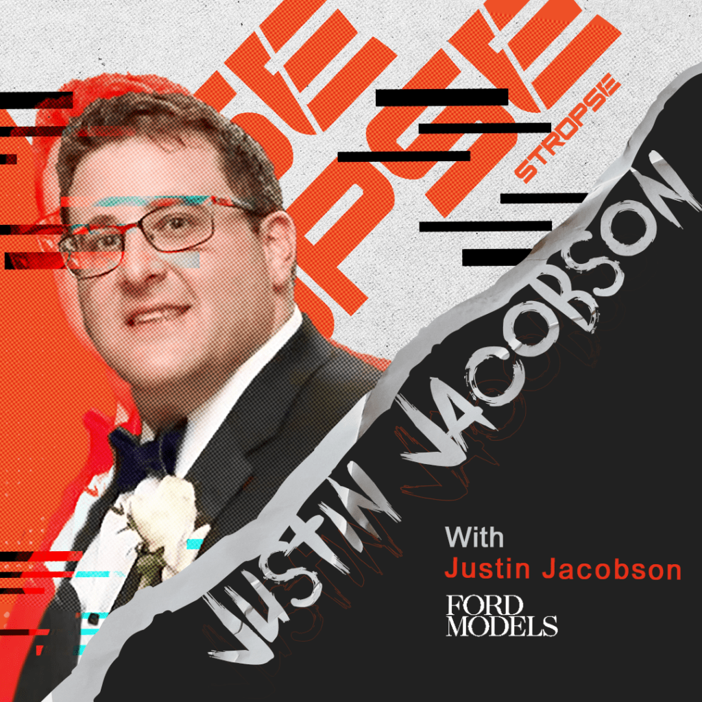 Man in suit with abstract background design.